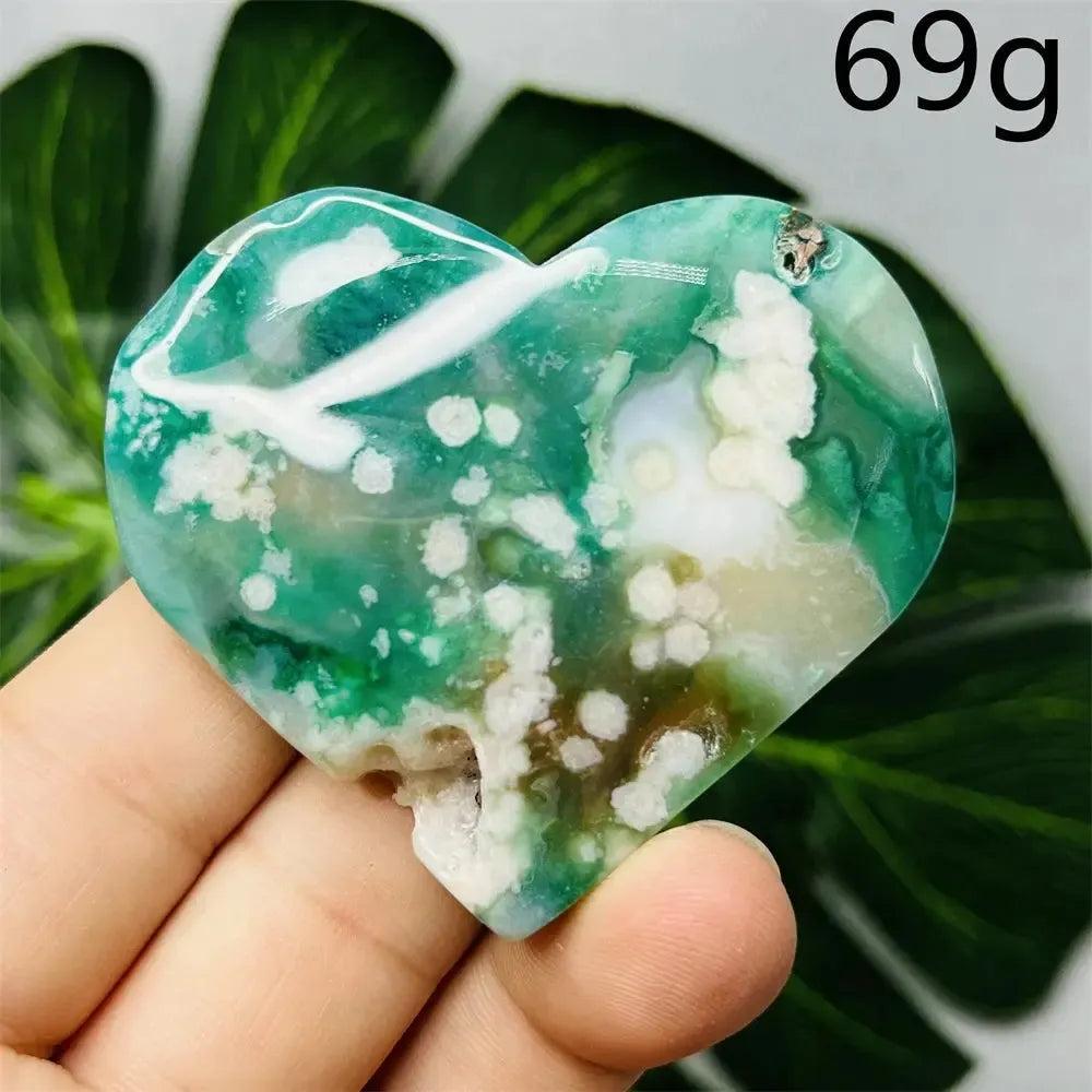 Green Agate Crystal Heart: Hand-carved, polished heart with vibrant green, white, and brown natural striations.