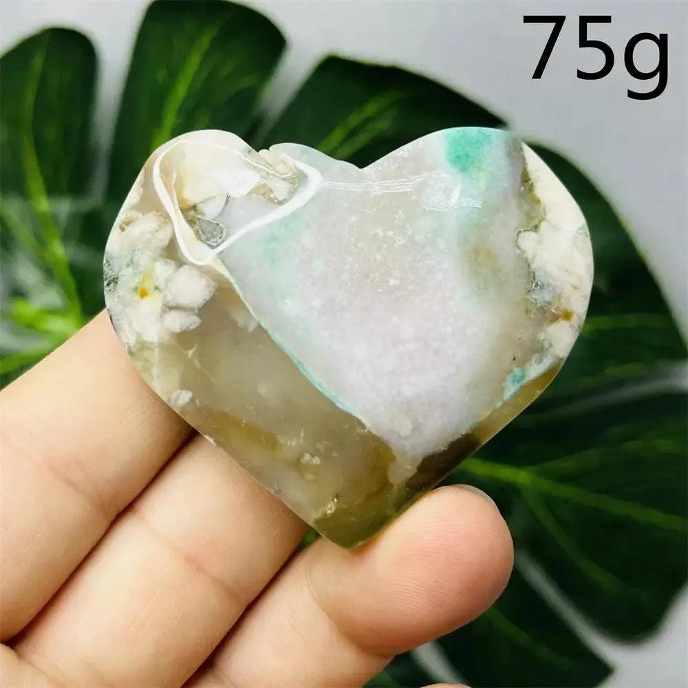 Green Agate Crystal Heart, hand-carved with natural green banding, promoting growth, abundance, and emotional balance.