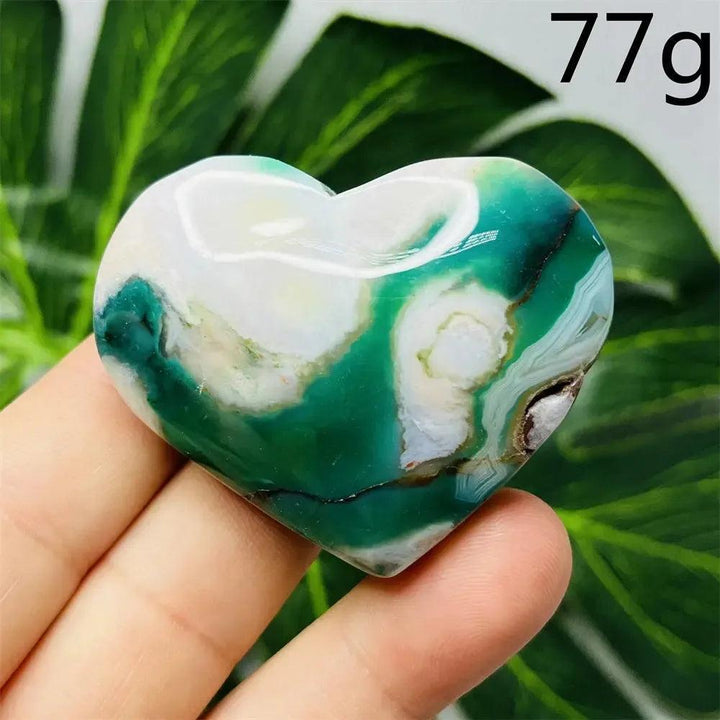 Hand-carved Green Agate Crystal Heart, 77g, with natural green banding and translucent beauty, promoting emotional balance.