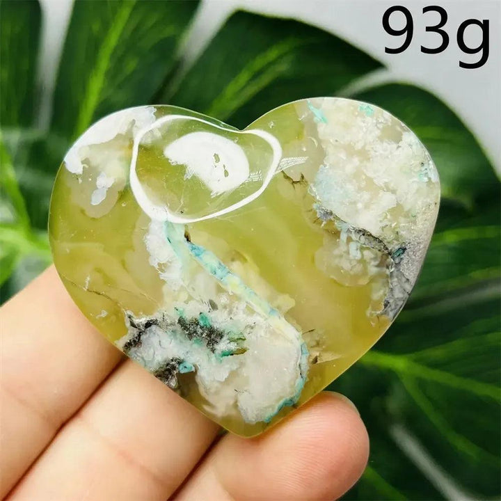 Hand-carved Green Agate Crystal Heart with unique green banding, promoting growth and emotional balance. 93g.