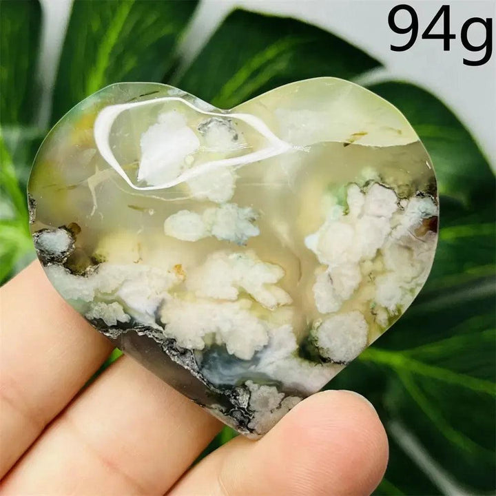Green Agate Crystal Heart: Hand-carved, translucent green agate heart with unique white cloud-like inclusions, 94g.