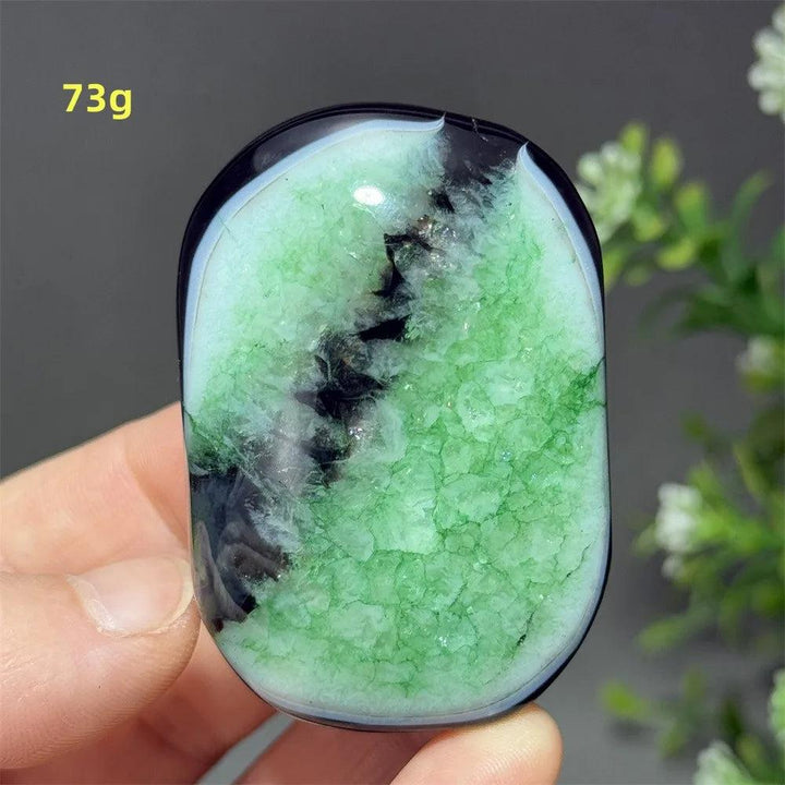 Polished 73g natural green agate palm stone with striking crystalline textures for reiki, meditation, and spiritual healing.