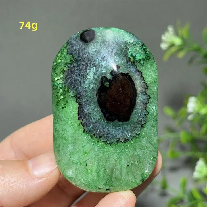 Polished 74g natural green agate palm stone with unique dark center for reiki healing, meditation, and spiritual decor.