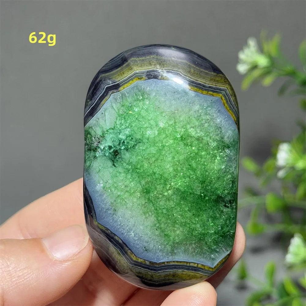 Polished 62g natural green agate palm stone with vibrant crystal druzy center, perfect for reiki and spiritual healing.
