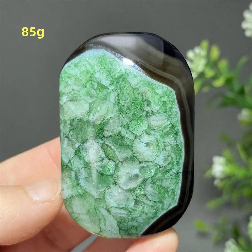 Polished 85g natural green agate palm stone with vibrant crystalline patterns, perfect for meditation and healing.