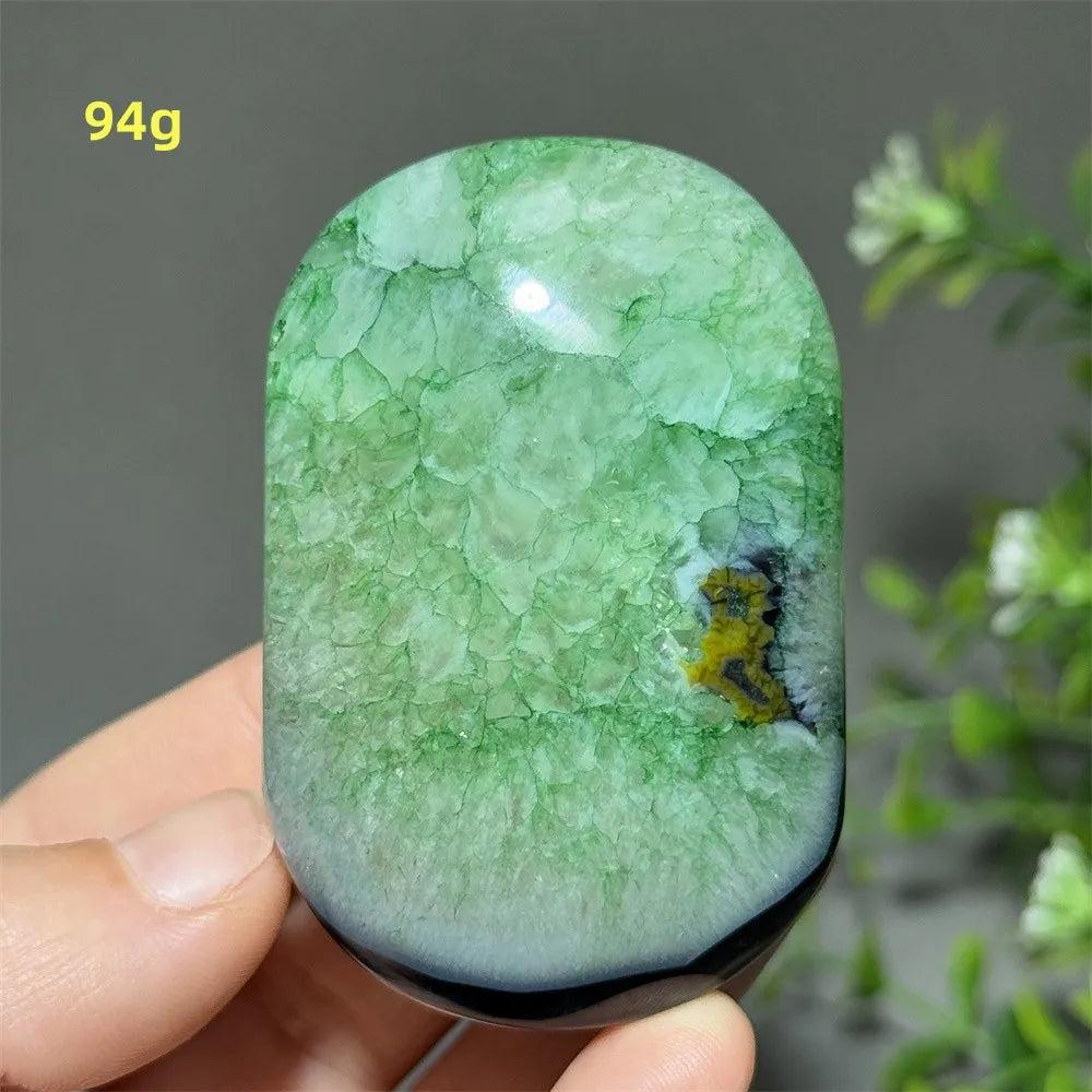 Polished 94g natural green agate palm stone with vibrant mossy patterns, perfect for reiki healing and meditation.
