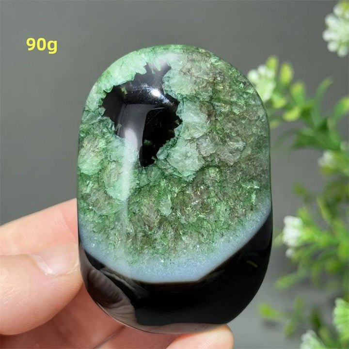 90g natural green agate palm stone with a polished black border, perfect for reiki healing and spiritual meditation.