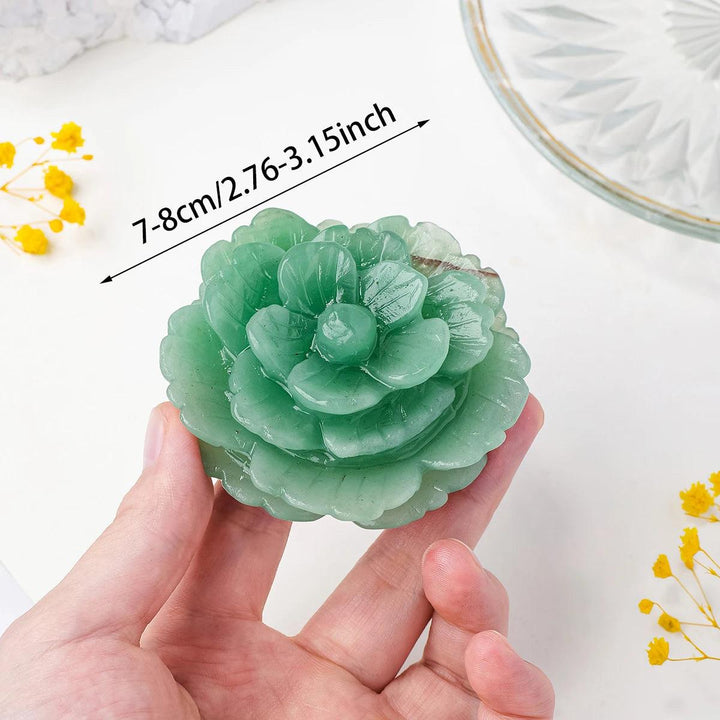 Hand-carved Green Aventurine peony flower crystal for abundance, measuring 7-8cm, held in hand for heart-centered healing.