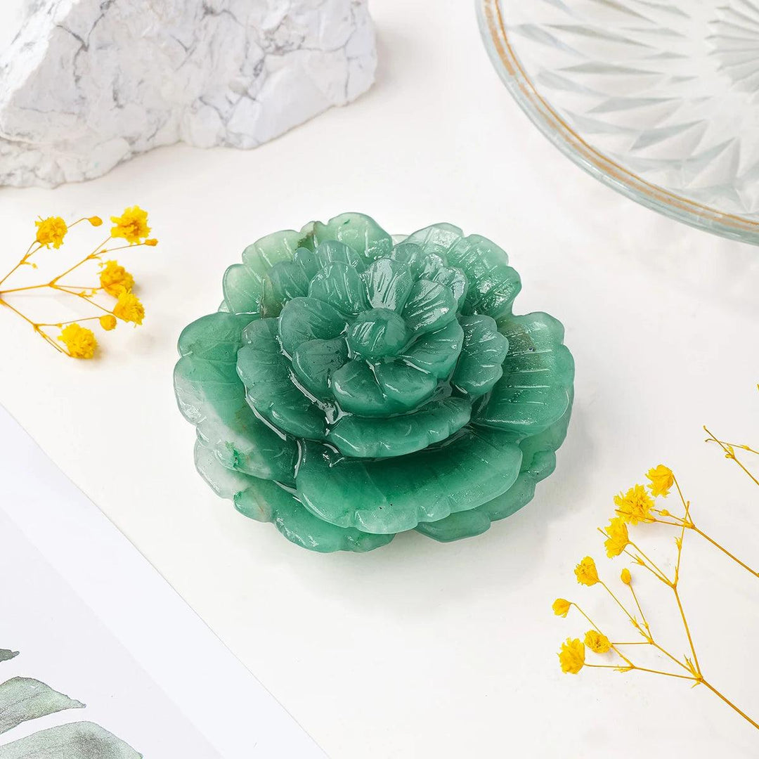 Hand-carved Green Aventurine peony flower crystal for abundance, featuring luminous green petals and heart-centered energy.