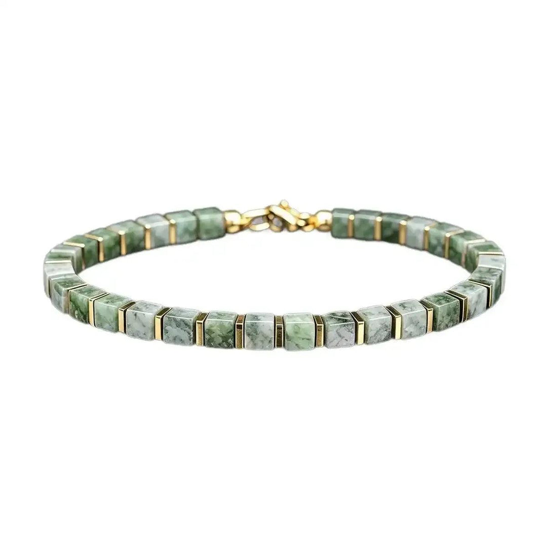 Green Aventurine square bead bracelet with gold-tone spacers, promoting heart chakra balance in a geometric design.