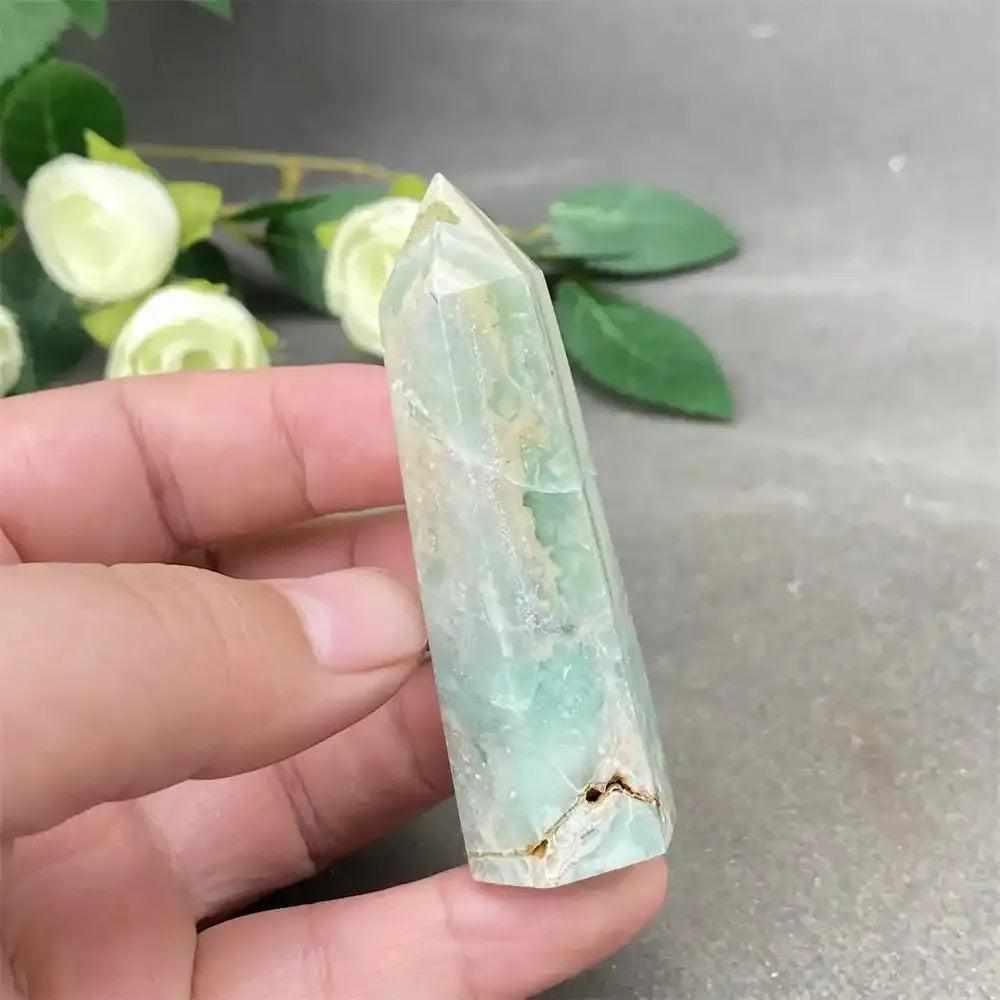 Hand-polished Green Calcite tower with soft banding and a waxy glow, perfect for Heart chakra balance and renewal.