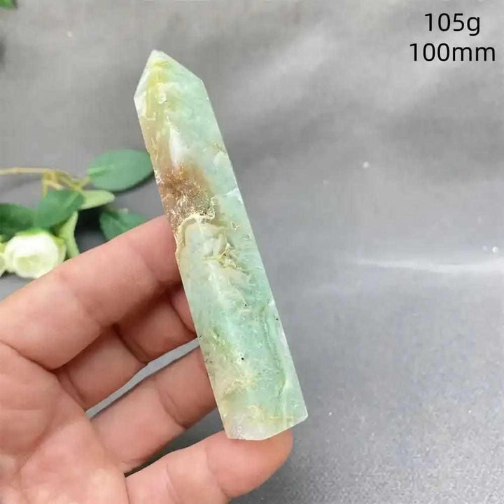 Hand-polished Green Calcite tower with soft banding and a faceted point for Heart chakra renewal and emotional balance.