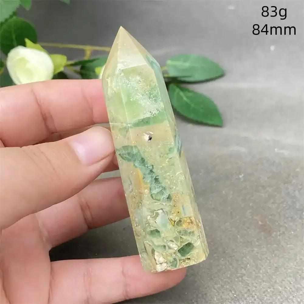Hand-polished green calcite tower with natural banding and a faceted point for Heart chakra healing and emotional balance.