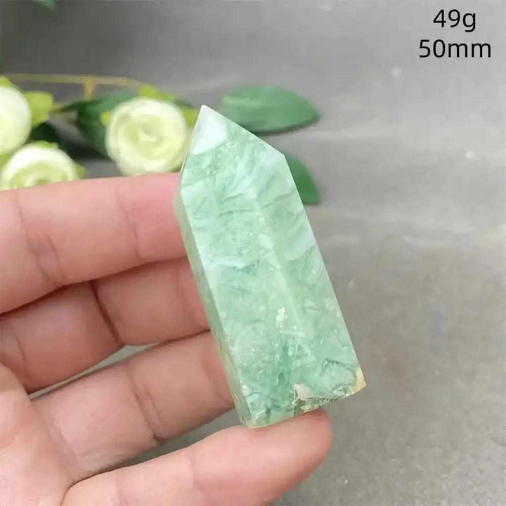 Hand-polished Green Calcite tower with soft banding and a waxy glow, perfect for Heart chakra healing and meditation.