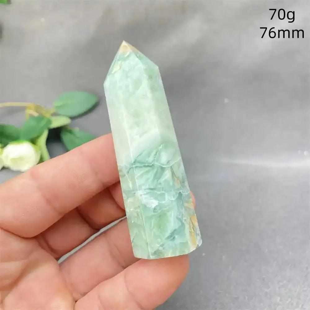 Hand-polished Green Calcite tower with natural banding and a waxy glow, perfect for Heart chakra healing and meditation.