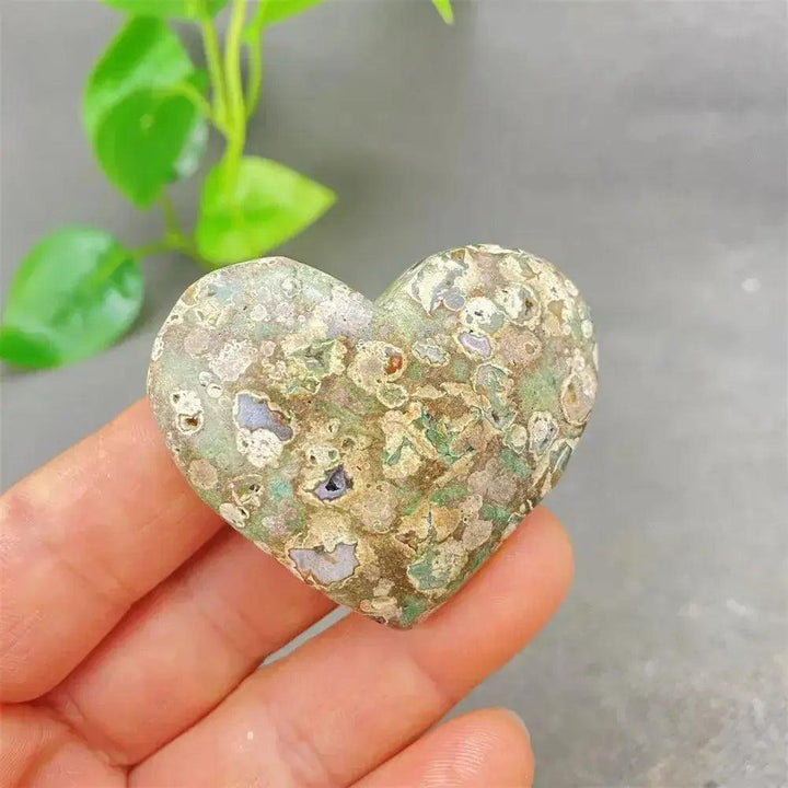 Green Cherry Agate Heart Crystal: Soothing, uplifting stone with soft green tones and cherry-like inclusions, promoting emotional balance.