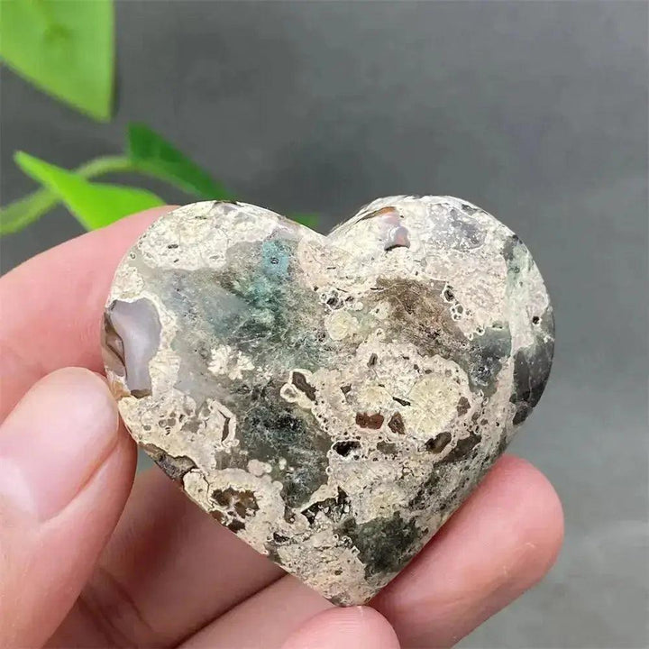 Green Cherry Agate Heart Crystal: Smooth, polished heart-shaped stone with soft green and cherry-like inclusions.