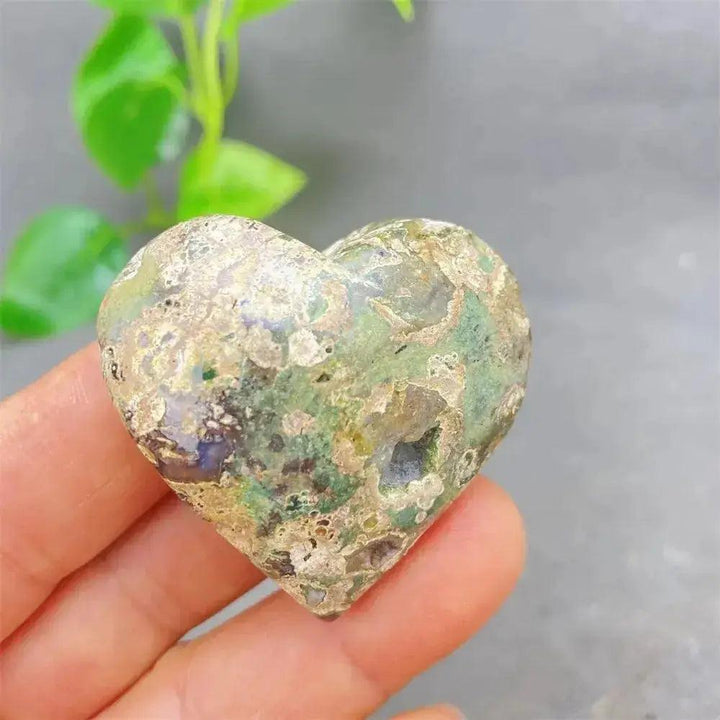 Green Cherry Agate Heart Crystal: Soothing, uplifting stone with soft green tones and cherry-like inclusions, promoting emotional balance.