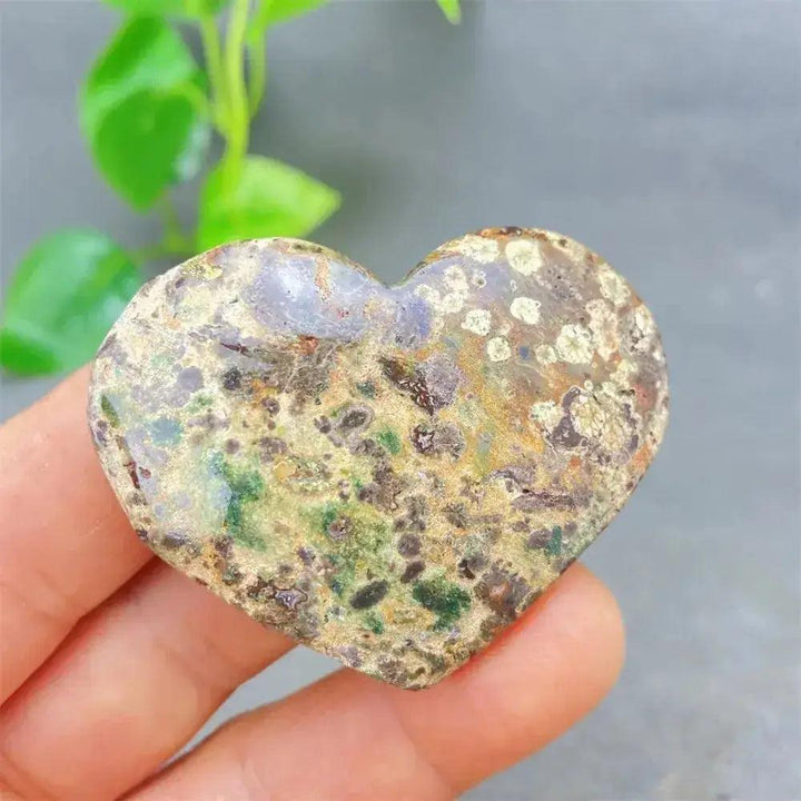 Green Cherry Agate Heart Crystal: Soothing, uplifting stone with soft green tones and cherry-like inclusions for emotional balance.