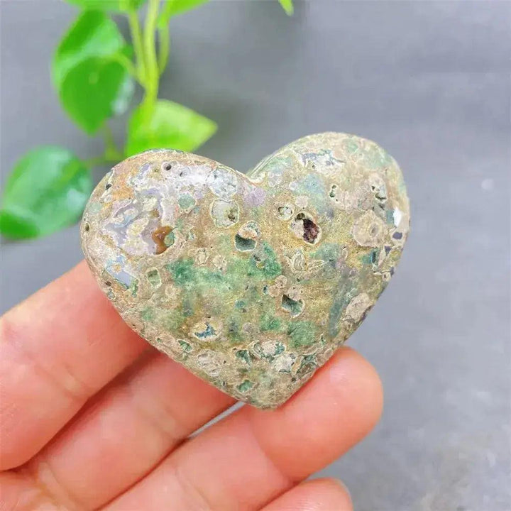 Green Cherry Agate Heart Crystal: unique, soothing heart-shaped stone with soft green tones, promoting emotional balance.