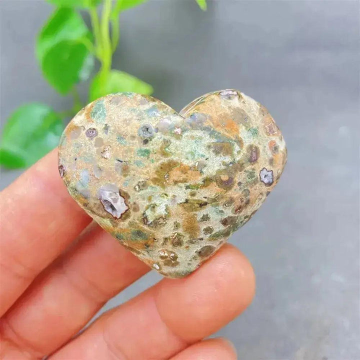 Green Cherry Agate Heart Crystal: A soothing, unique heart-shaped stone with soft green and cherry-like inclusions.