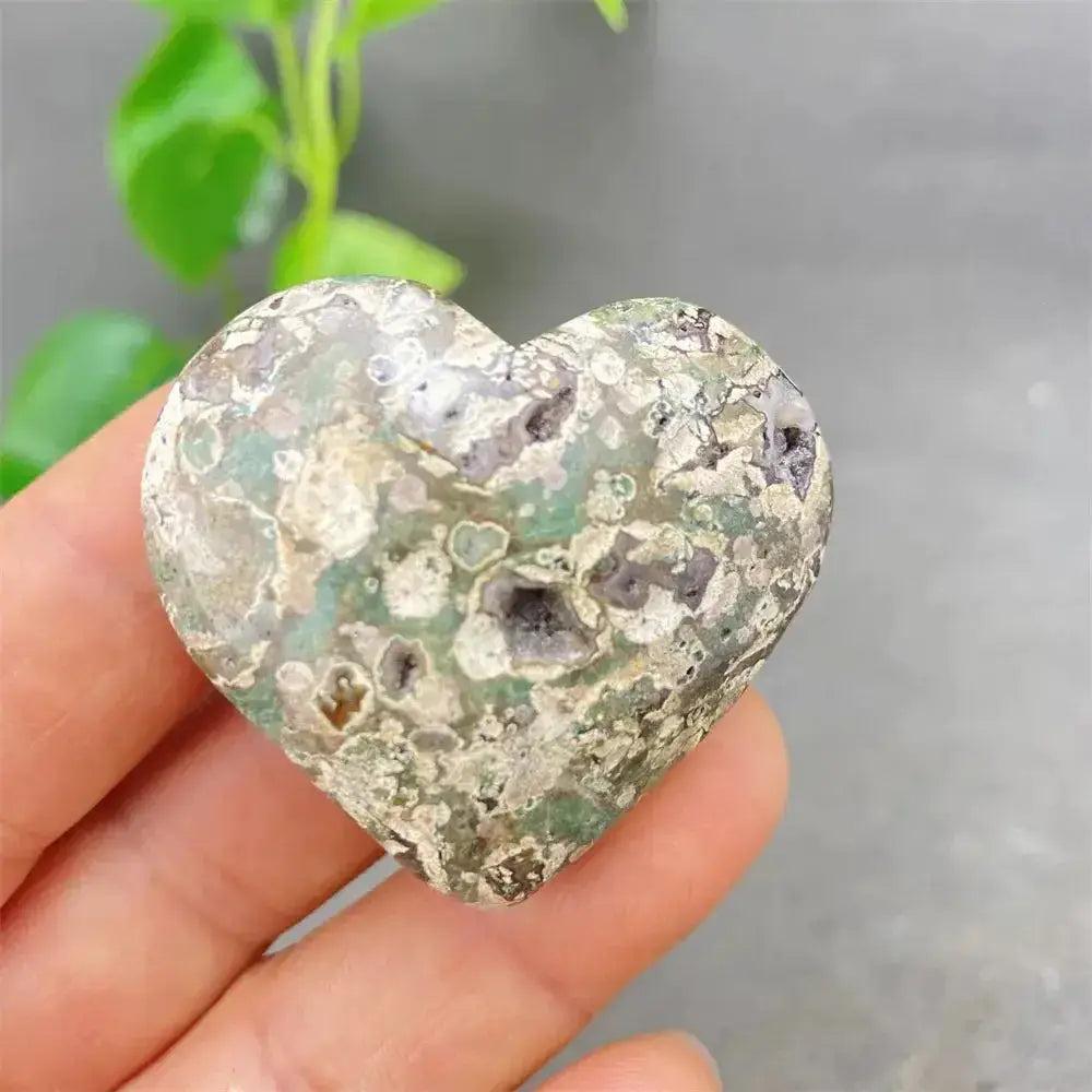 Green Cherry Agate Heart Crystal: Soothing, uplifting heart-shaped stone with soft green tones and cherry-like inclusions.