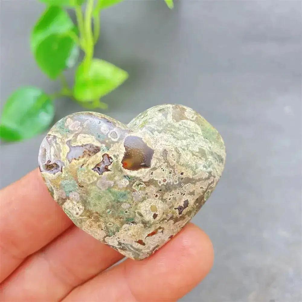 Green Cherry Agate Heart Crystal: Soothing, uplifting heart-shaped stone with soft green tones and cherry-like inclusions.