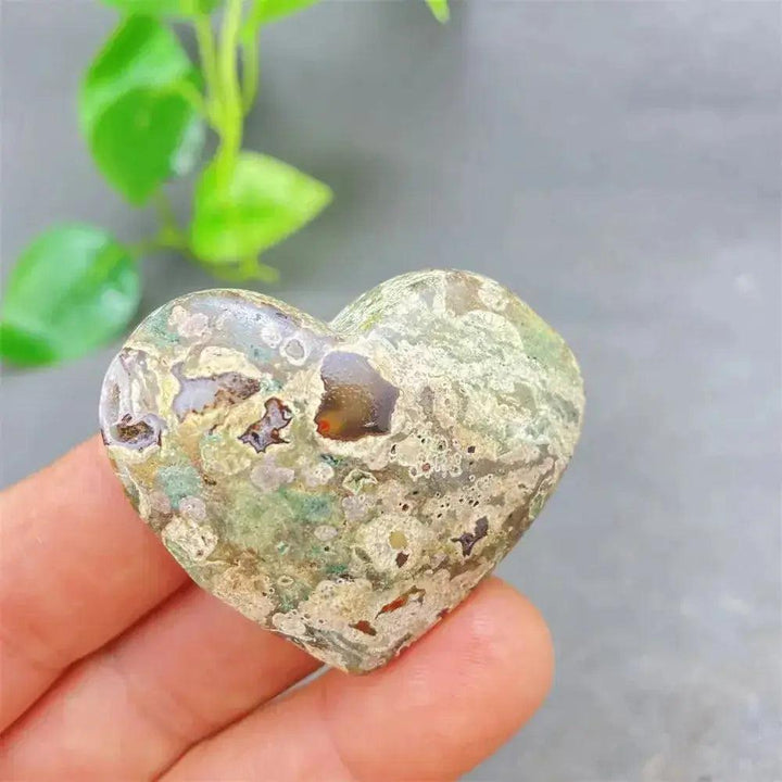 Green Cherry Agate Heart Crystal: Soothing, uplifting heart-shaped stone with soft green tones and cherry-like inclusions.