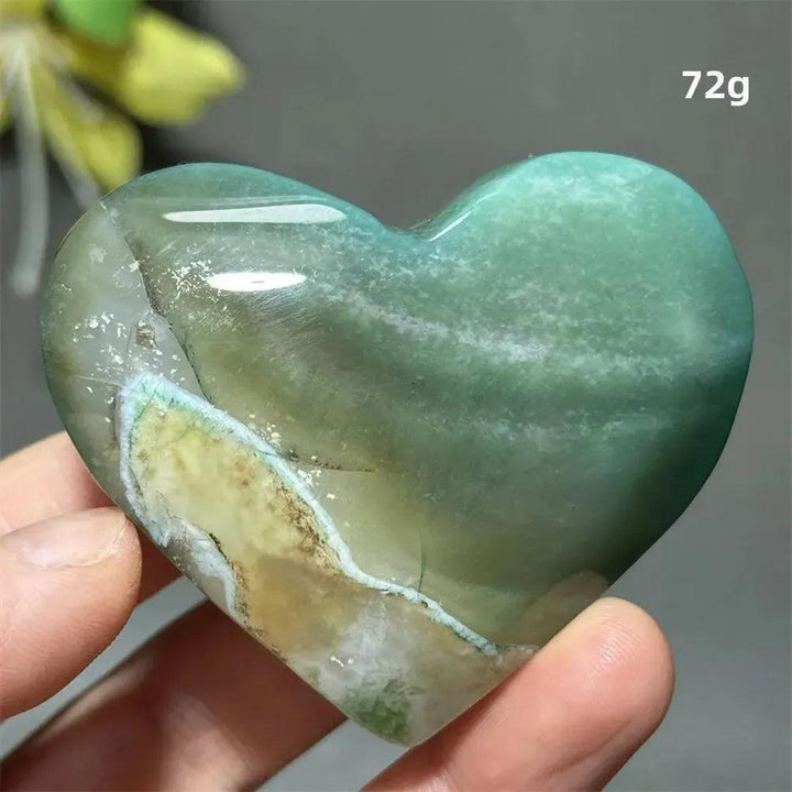 Polished Green Cherry Agate Crystal Heart, 72g, showcasing soft green hues with unique flower-like plumes for growth and self-love.