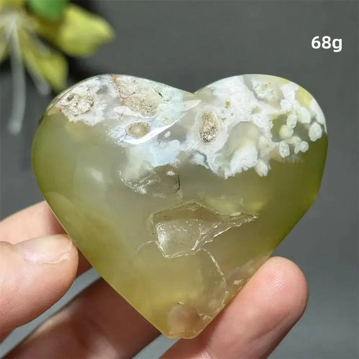 Green Cherry Agate Crystal Heart: Polished, heart-shaped stone with soft green hues and delicate flower-like patterns.