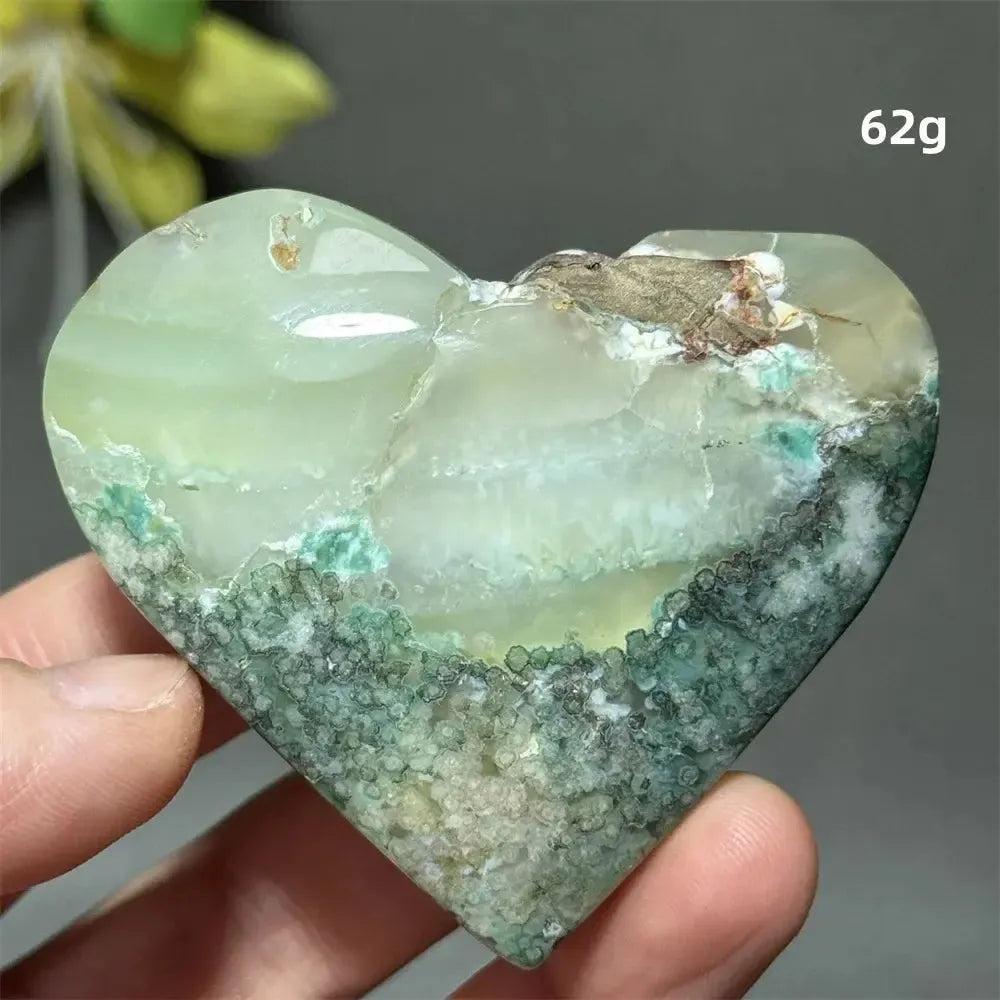 Polished Green Cherry Agate Crystal Heart, showcasing delicate flower-like plumes and cherry blossom patterns.