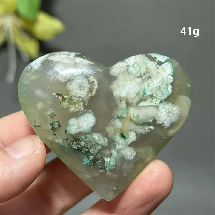Green Cherry Agate Crystal Heart, a polished stone with soft green hues and delicate flower-like plumes, 41g.