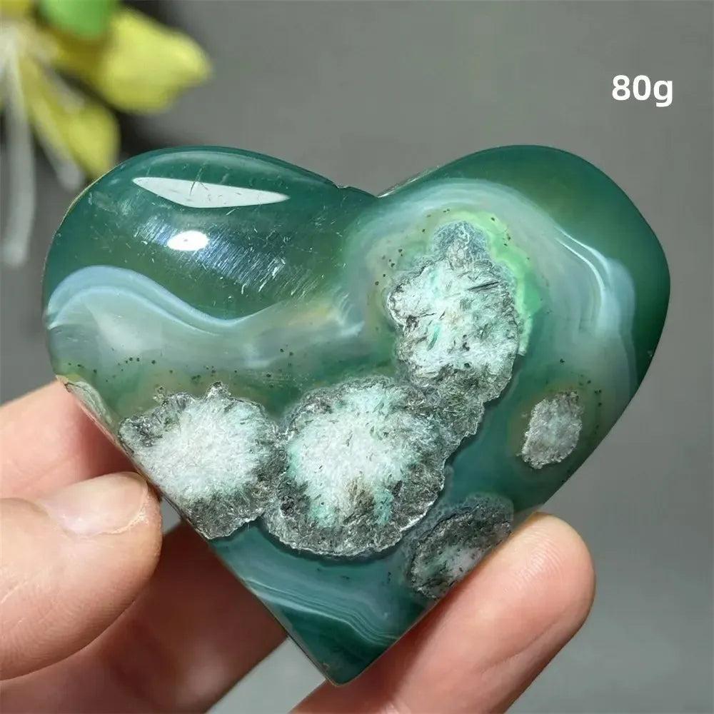 Polished Green Cherry Agate Crystal Heart with unique flower-like plumes and cherry blossom patterns, promoting growth and self-love.