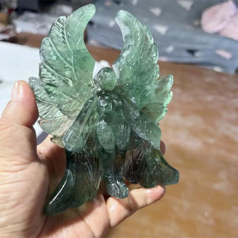 Hand-carved green fluorite Seraph angel figurine with luminous, forest-green wings for spiritual clarity and healing.