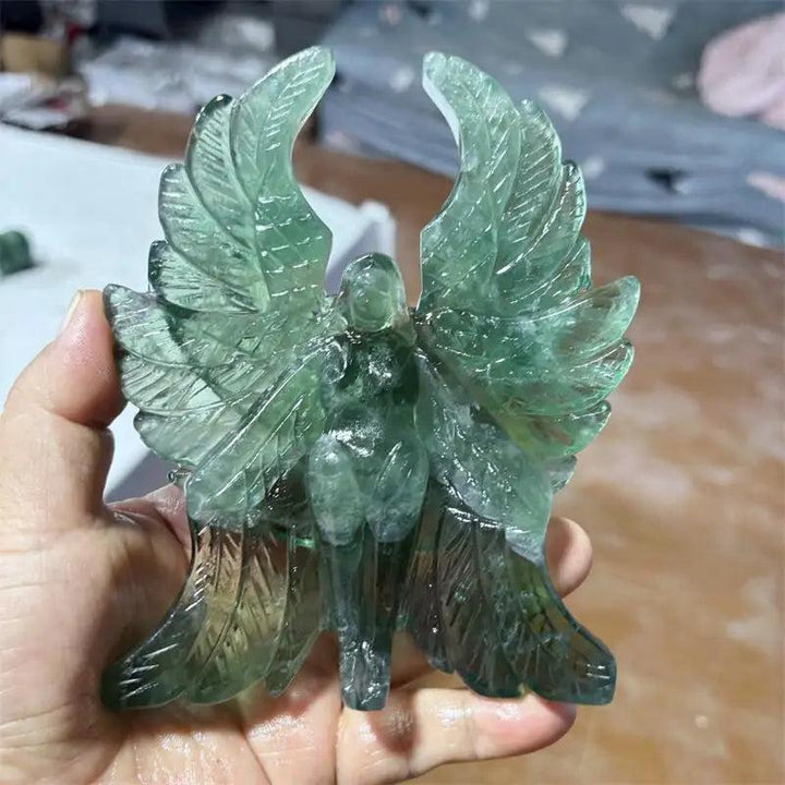 Hand-polished Green Fluorite Seraph Angel figurine with luminous forest green tones for spiritual clarity and healing.