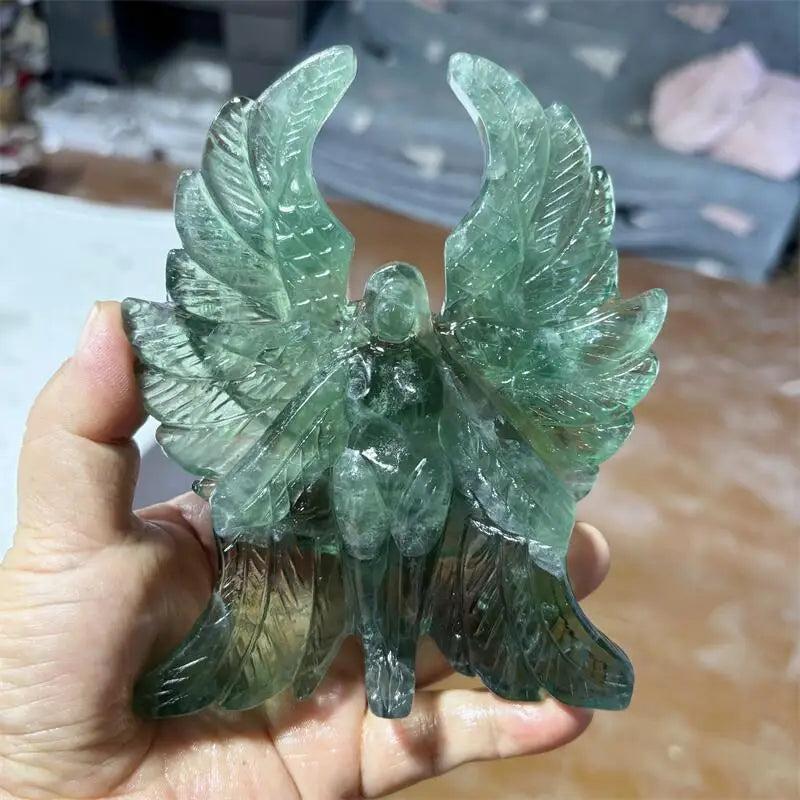 Hand-polished Green Fluorite Seraph Angel figurine with luminous mint to forest green hues for spiritual clarity.