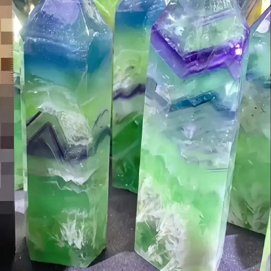 Polished Green Fluorite Crystal Tower Obelisk, showcasing vibrant green, blue, and purple banding for mental clarity.