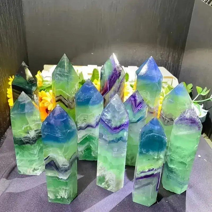 Vibrant Green Fluorite Crystal Tower Obelisks, hand-polished with natural banding for mental clarity and focus.