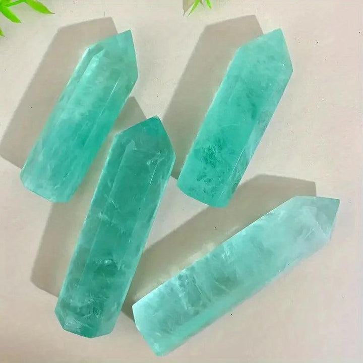 Four translucent Green Fluorite Crystal Towers for mental clarity and heart healing.