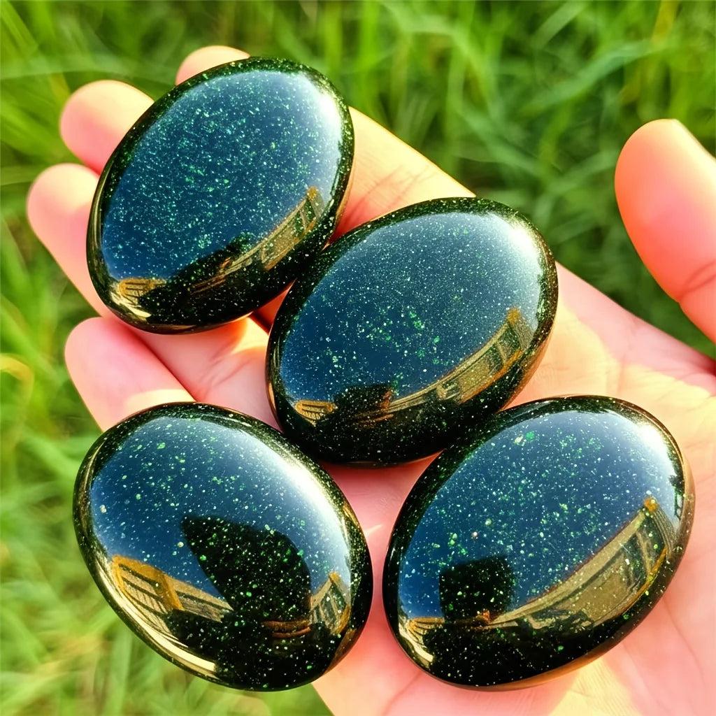 Polished green sandstone palm stones with sparkling flecks for luck and meditation.