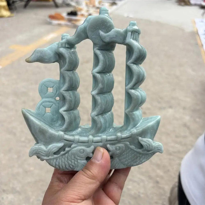 Hand-carved green jade sailboat statue for prosperity, featuring intricate details to manifest abundance and harmony.