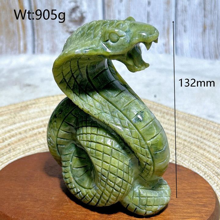 Hand-carved green jasper cobra sculpture, 132mm tall, grounding crystal for heart and root chakra energy.