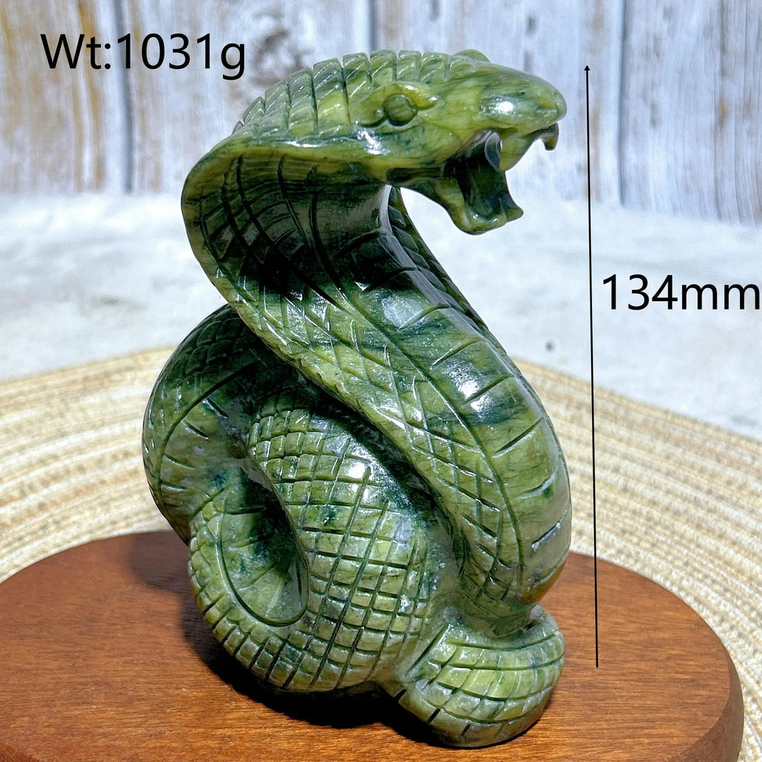 Hand-carved green jasper cobra statue, 134mm tall, featuring intricate scales for grounding and heart chakra healing.