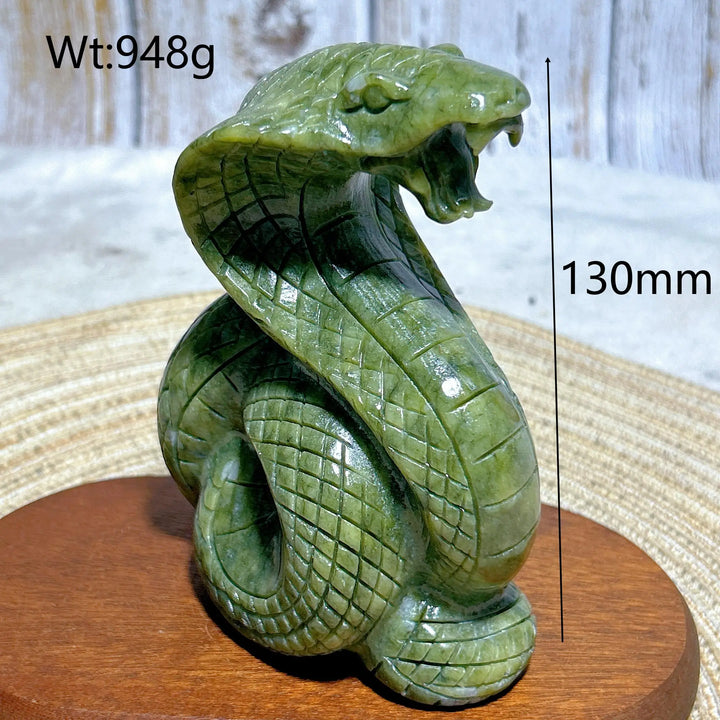 Hand-carved 130mm green jasper cobra statue, a grounding crystal sculpture for heart and root chakra healing.