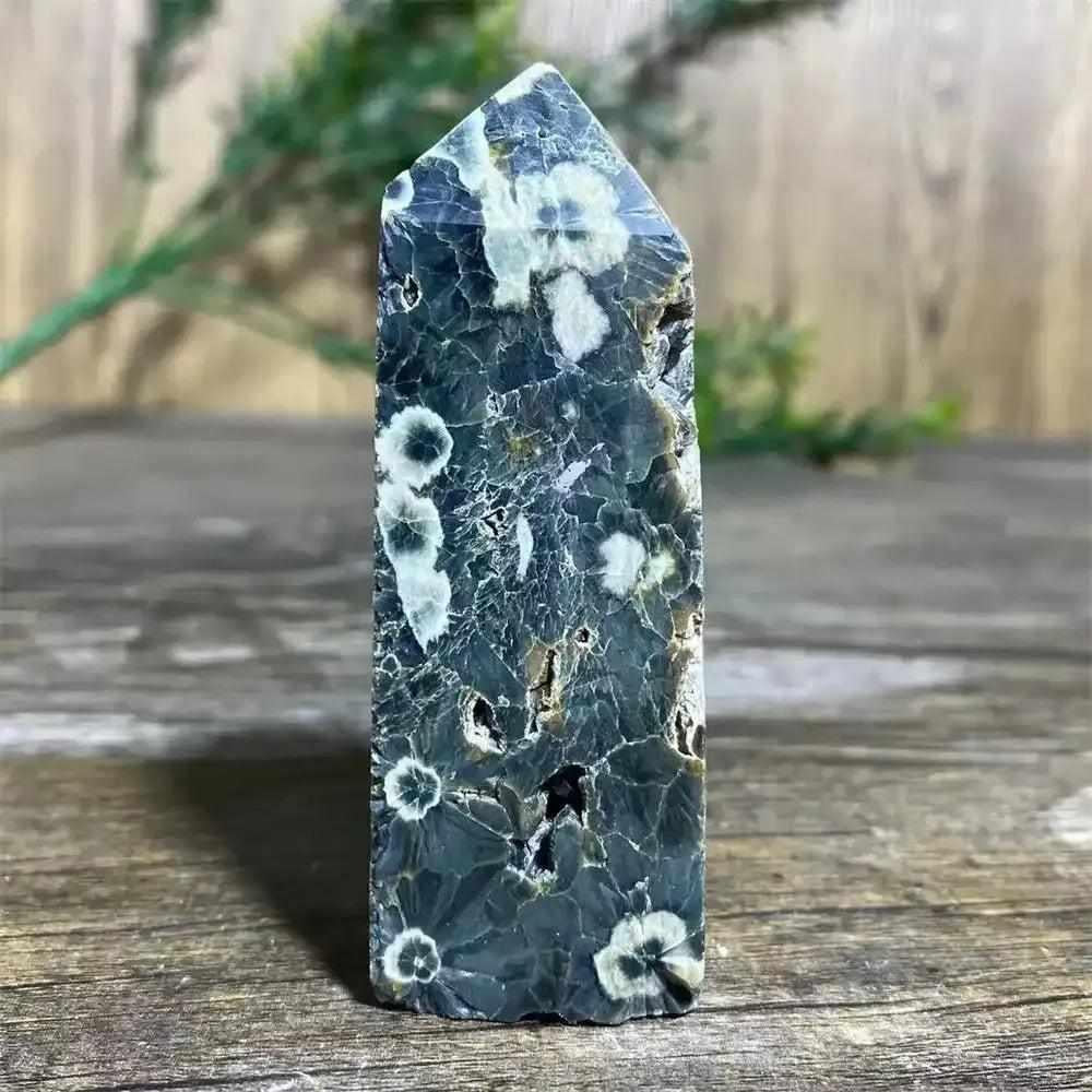 Polished Green Ocean Jasper tower featuring calming green tones and creamy orb patterns for Heart Chakra healing.