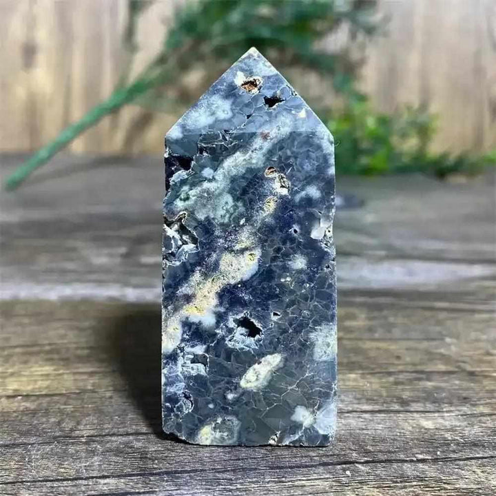 Polished Green Ocean Jasper tower featuring calming green tones, creamy orbs, and natural textures for Heart Chakra healing.