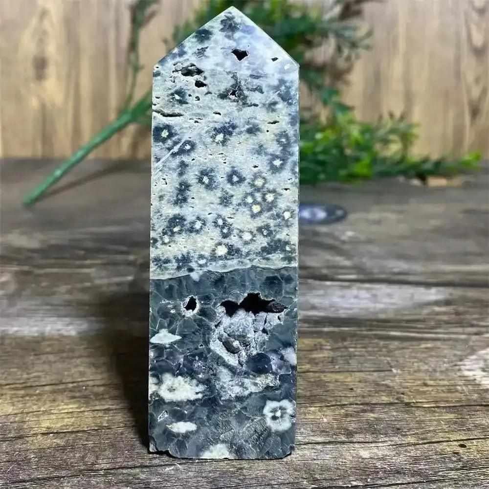 Polished Green Ocean Jasper tower featuring calming green tones, unique orbicular patterns, and a natural crystal point.