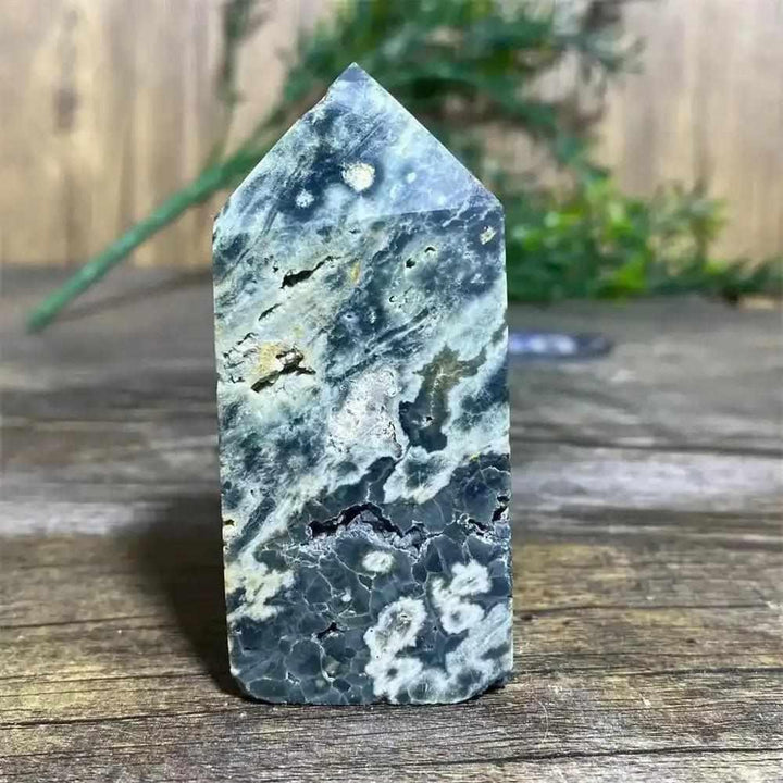 Polished Green Ocean Jasper tower featuring calming green tones, creamy orbs, and natural swirls for heart chakra healing.