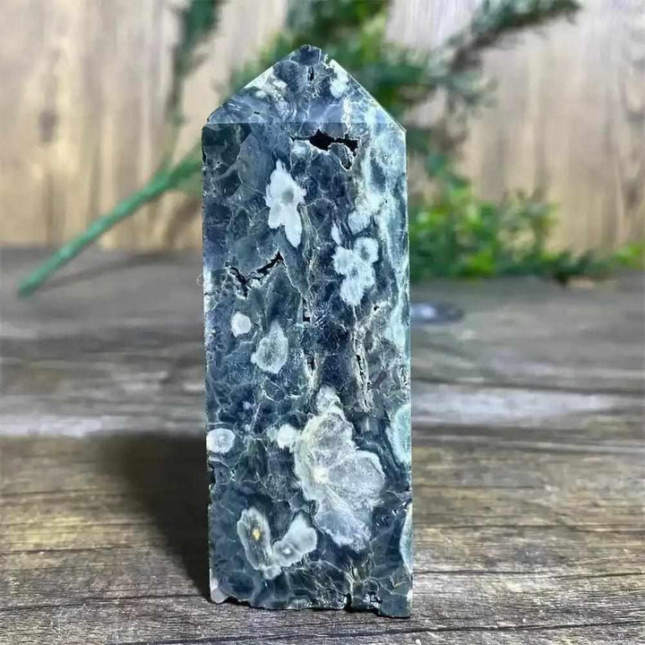 Polished Green Ocean Jasper tower featuring calming green tones and creamy orb patterns for Heart Chakra healing.