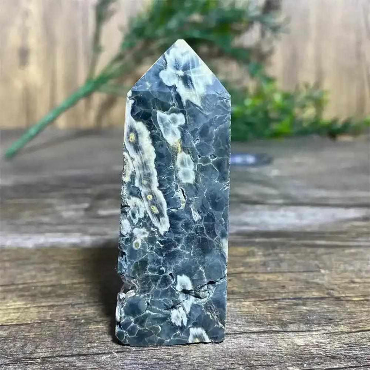 Polished Green Ocean Jasper tower featuring calming green tones and creamy orb patterns for Heart Chakra healing.